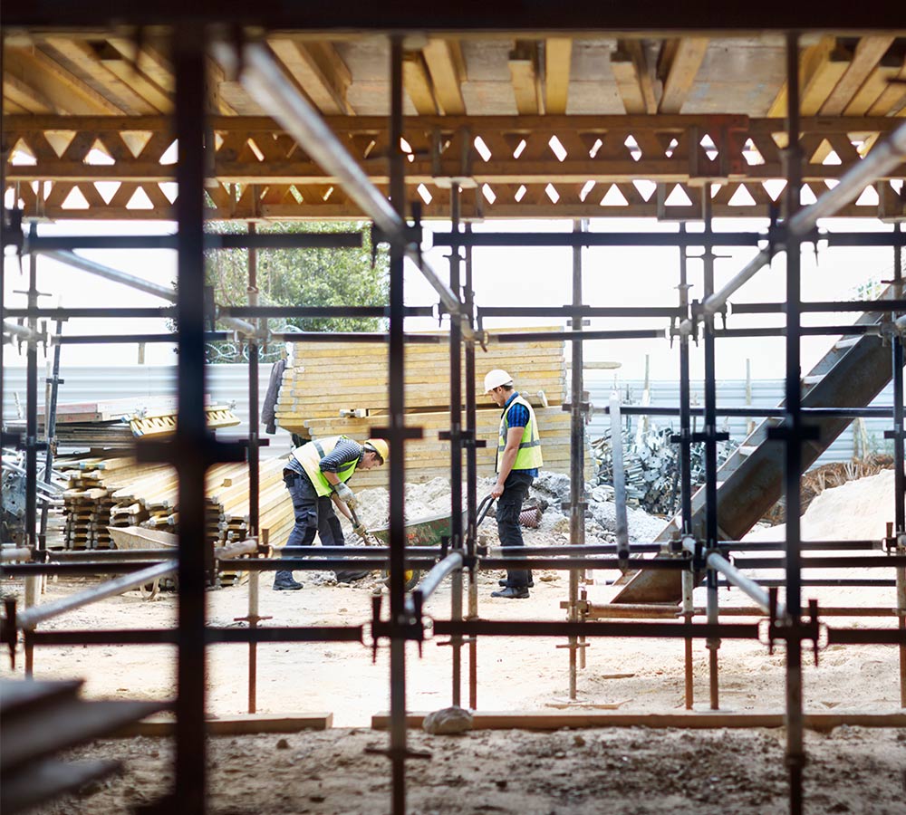 construction-workers-putting-in-foundation.jpg