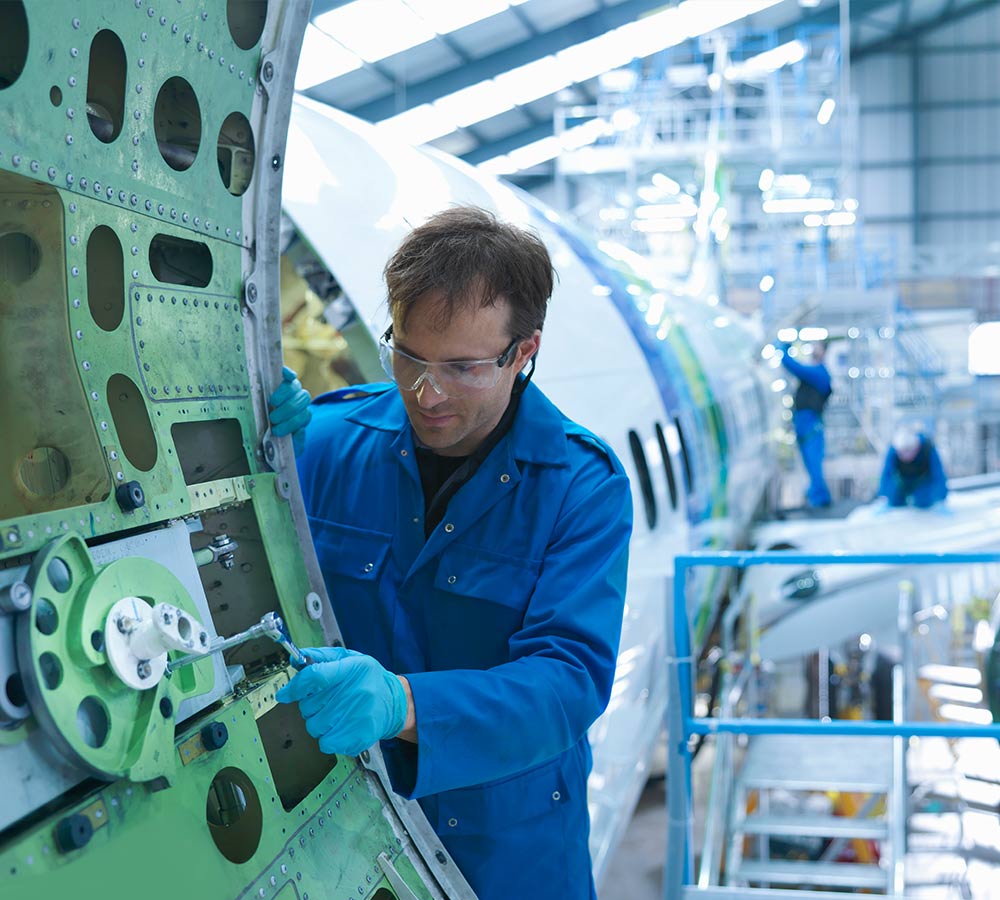 aerospace-engineer-working-on-actuator.jpg