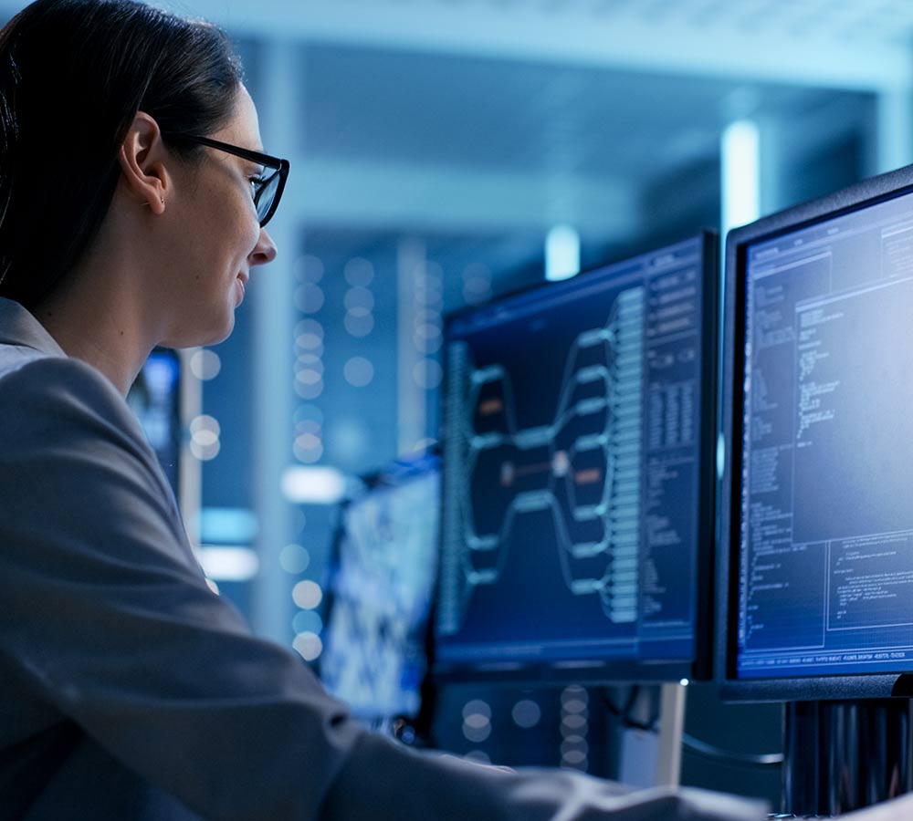 woman-monitoring-control-room-cyber-defense.jpg