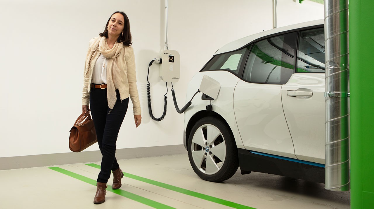 woman-building-garage-EV-charging.jpg