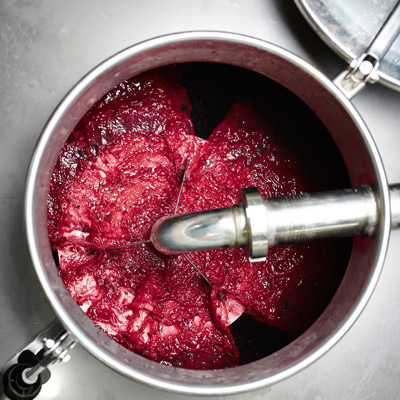 red-wine-must-being-pumped-over-gm526617711