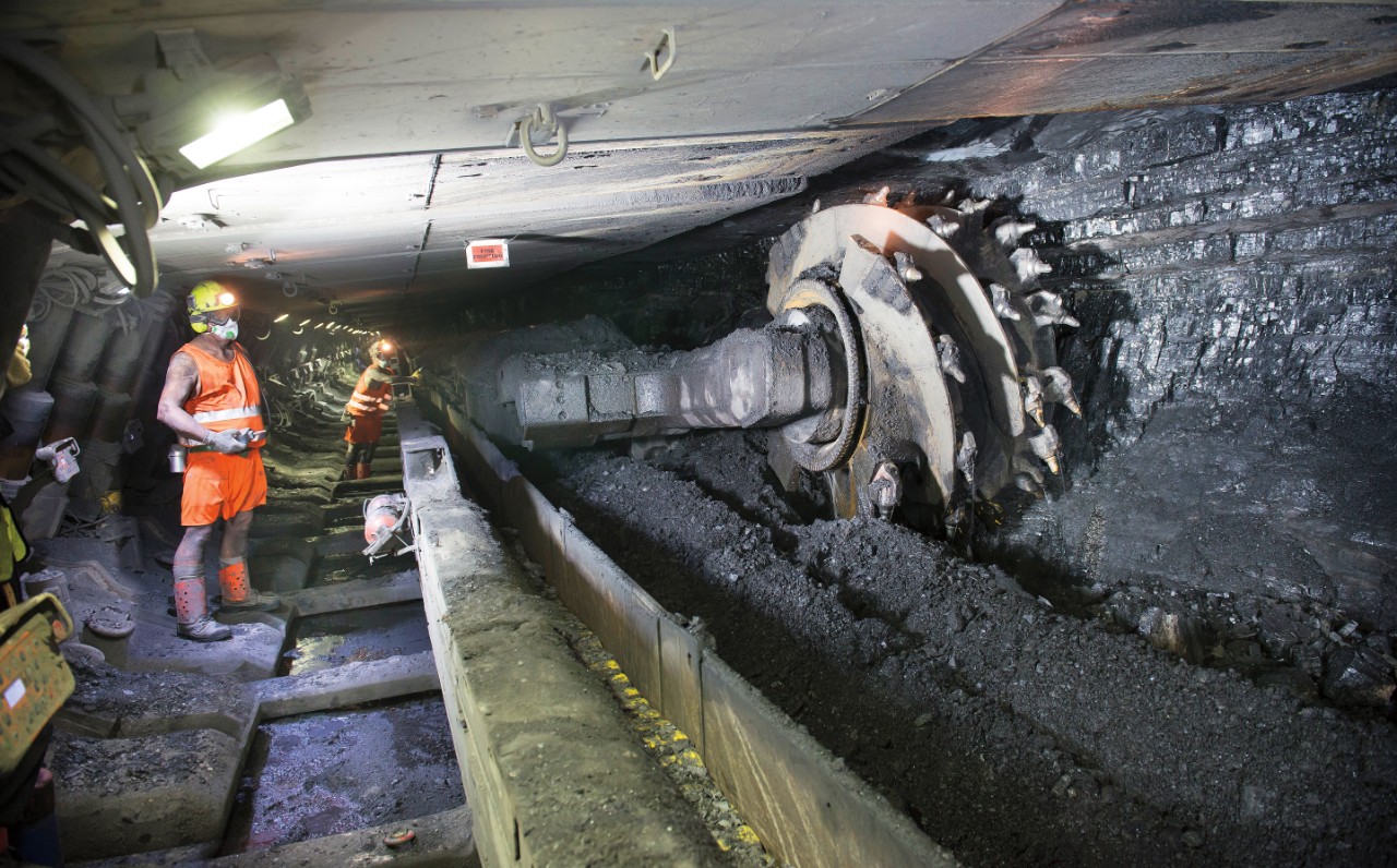 Coal miner working in mine