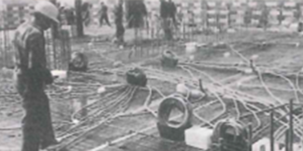 Old image showing Eaton Capri's first octopus concrete wire management system.